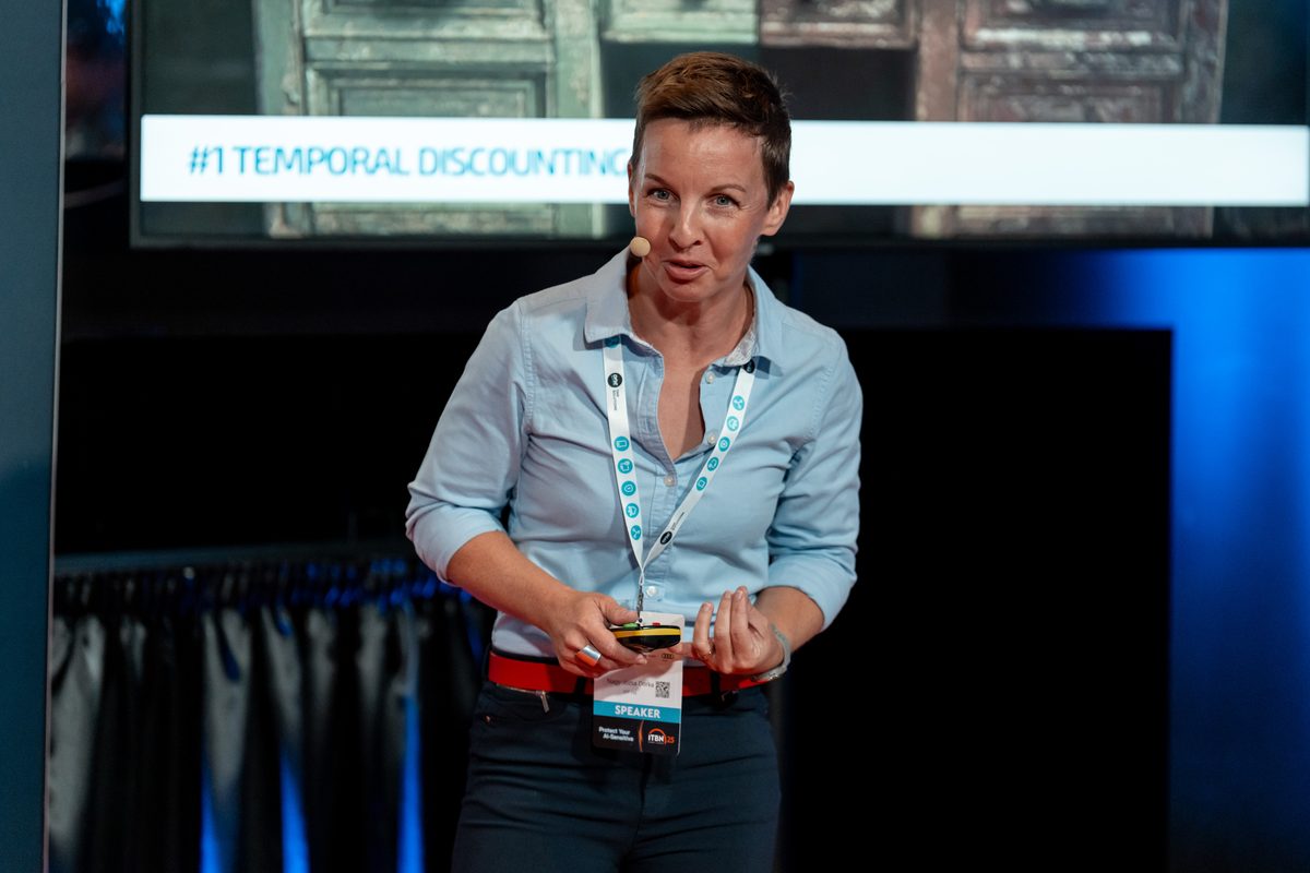Dorka Nagy-Józsa speaking on stage
